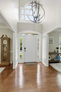 a view of a livingroom with wooden floor