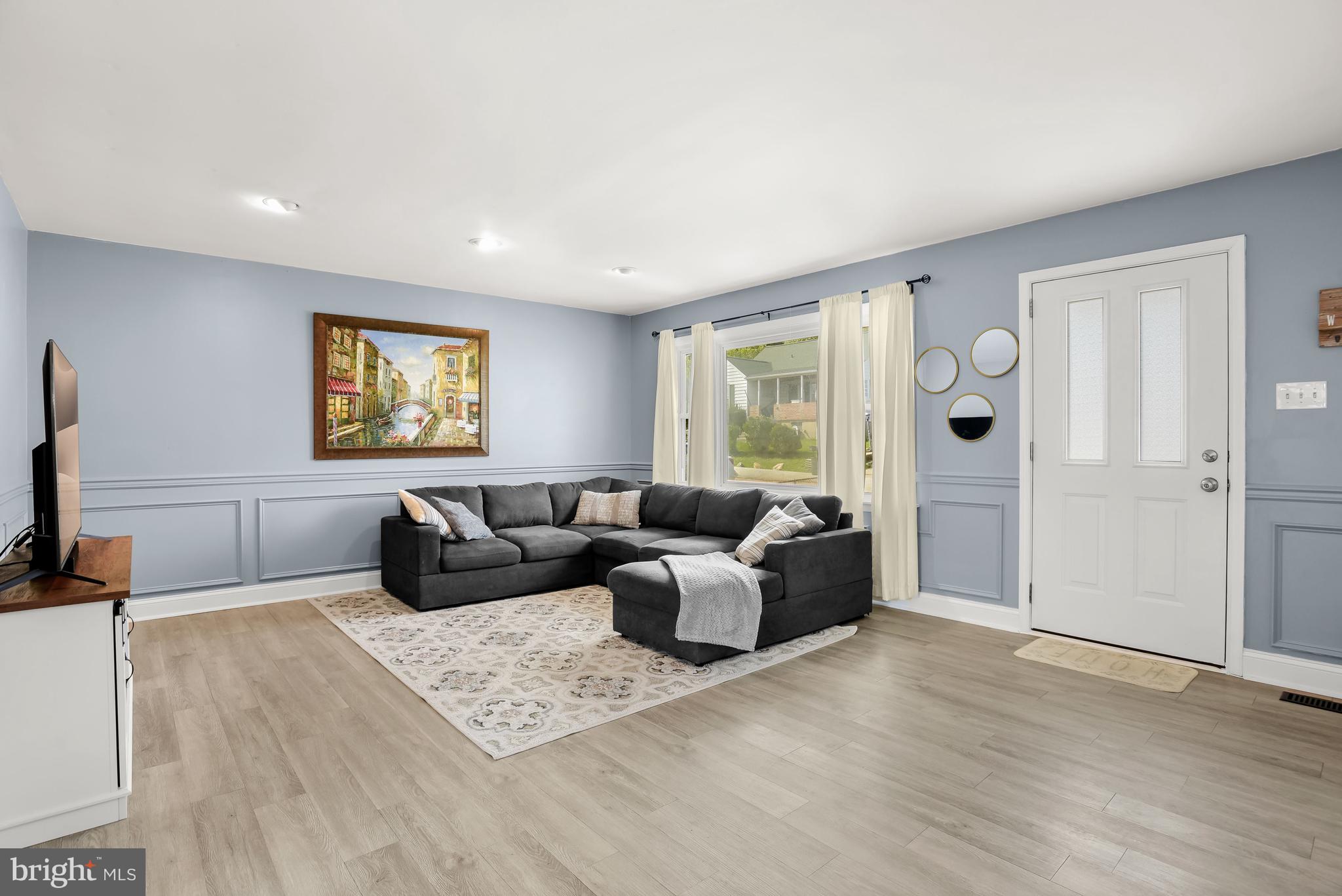 1323 Willow Spring Road Catonsville, MD 21228 - Photo 2 of 45 Sun filled living room with recessed lighting