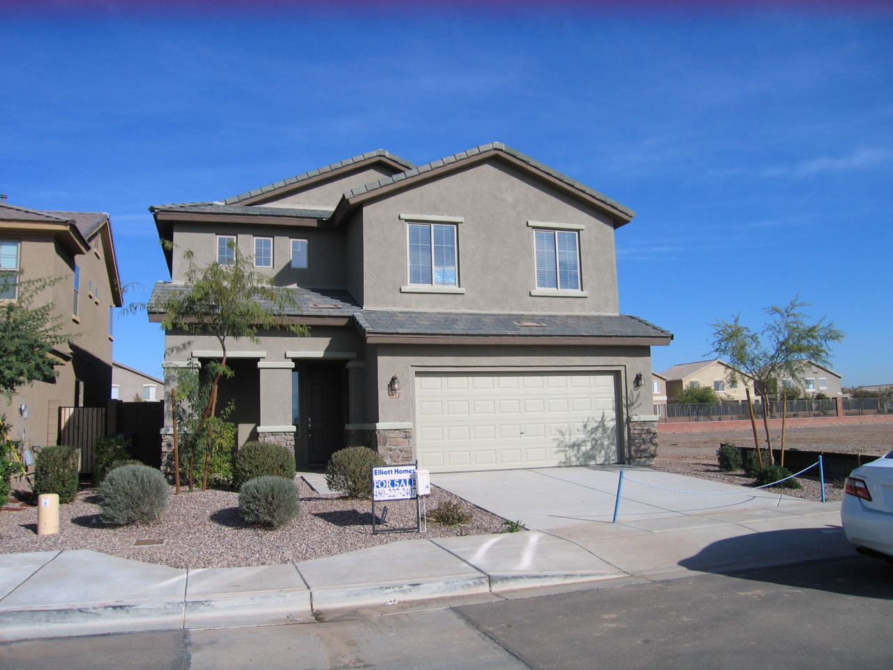 6912 West Harwell Road Laveen, AZ 85339 - Photo 1 of 14 Front with Sun