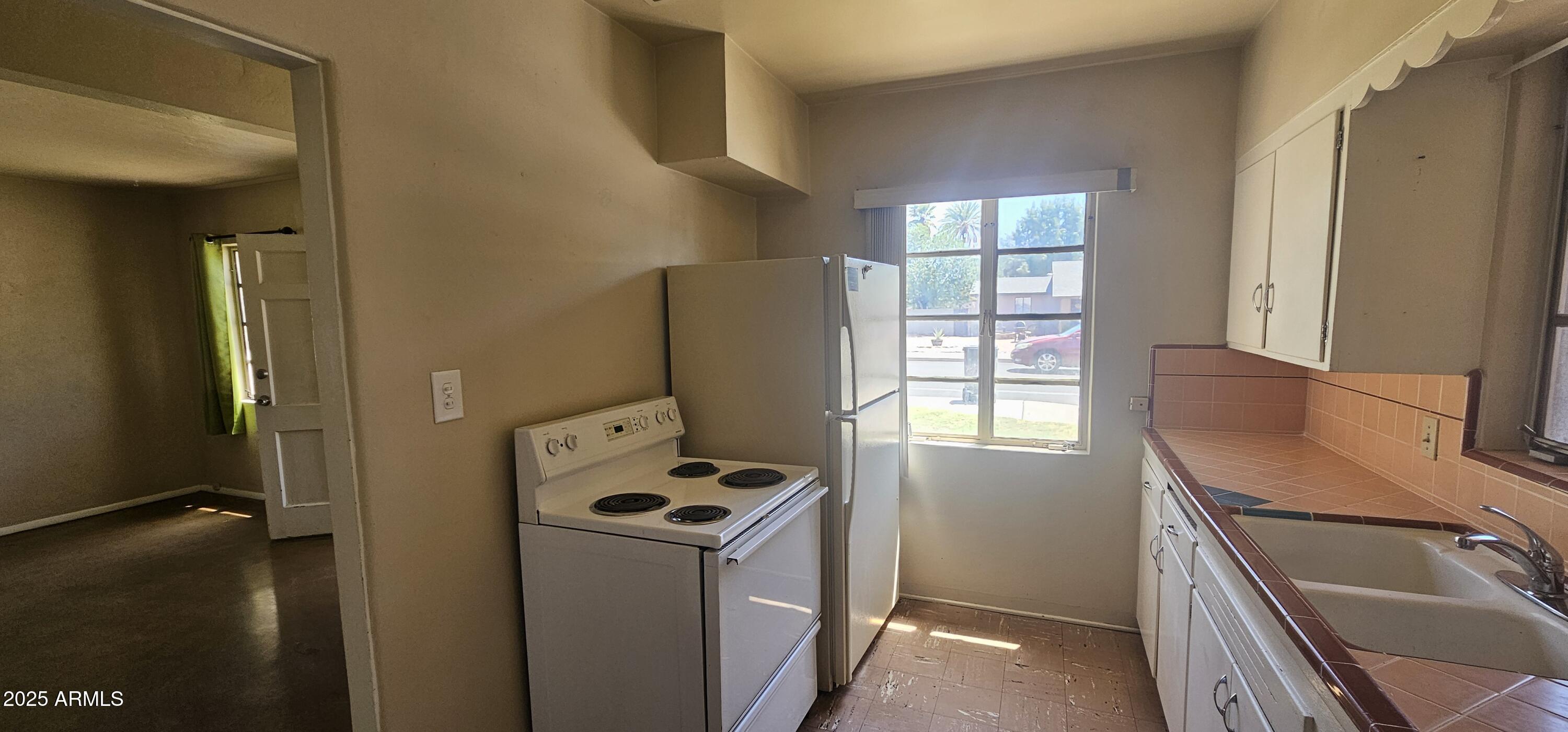 1234 South Farmer Avenue Tempe, AZ 85281 - Photo 17 of 47 a room with storage and utility