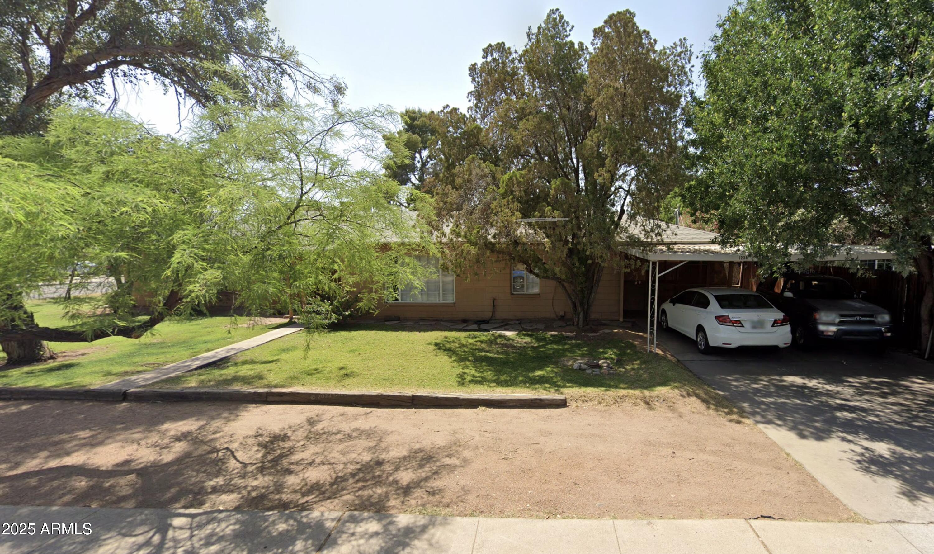1234 South Farmer Avenue Tempe, AZ 85281 - Photo 2 of 47 a view of a yard with cars parked