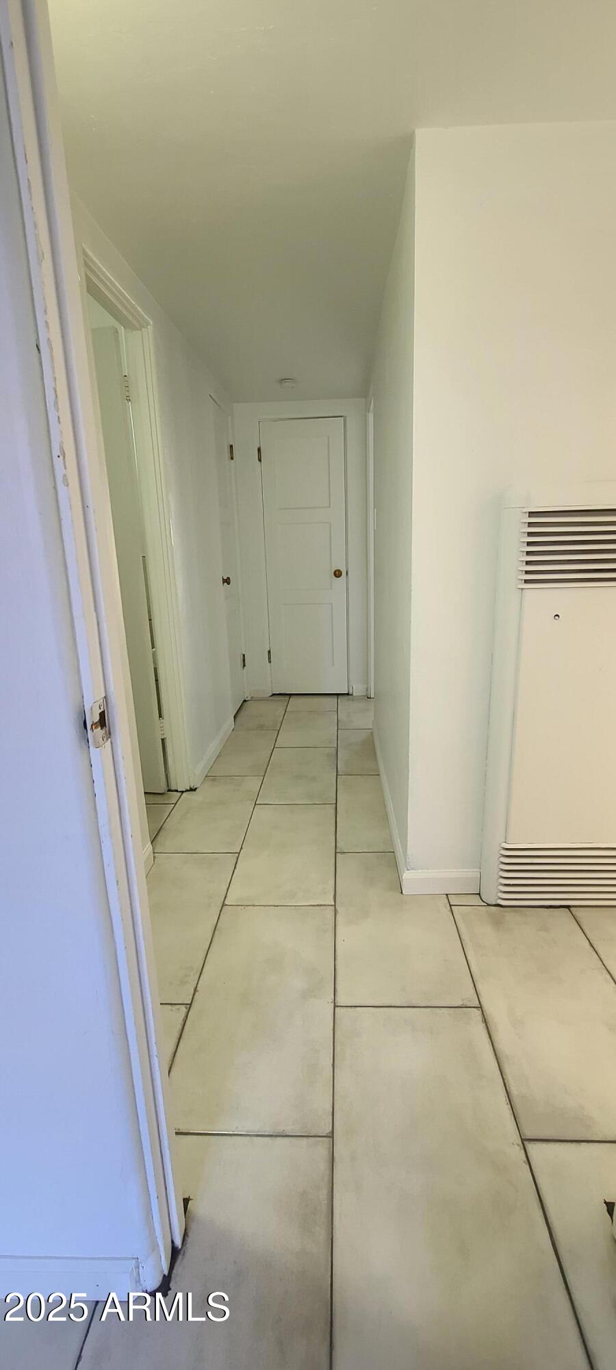 1234 South Farmer Avenue Tempe, AZ 85281 - Photo 23 of 47 a view of a room with white door