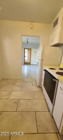 a bathroom with a sink a toilet and dryer