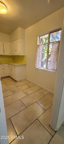 en empty room with windows