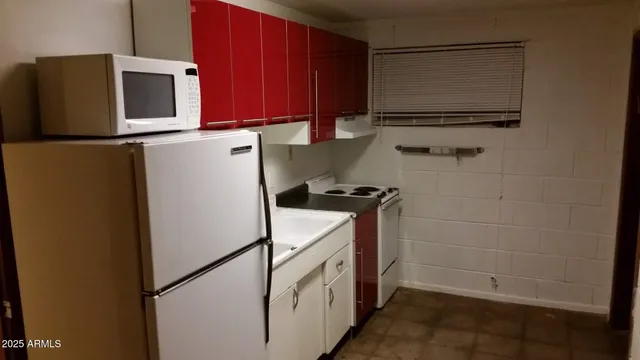 a view of balcony with furniture