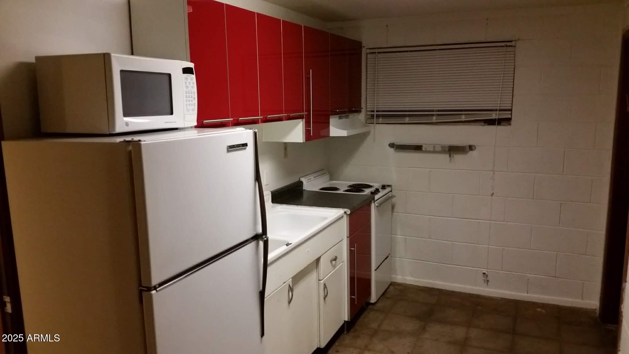 1234 South Farmer Avenue Tempe, AZ 85281 - Photo 41 of 47 a utility room with dryer and washer