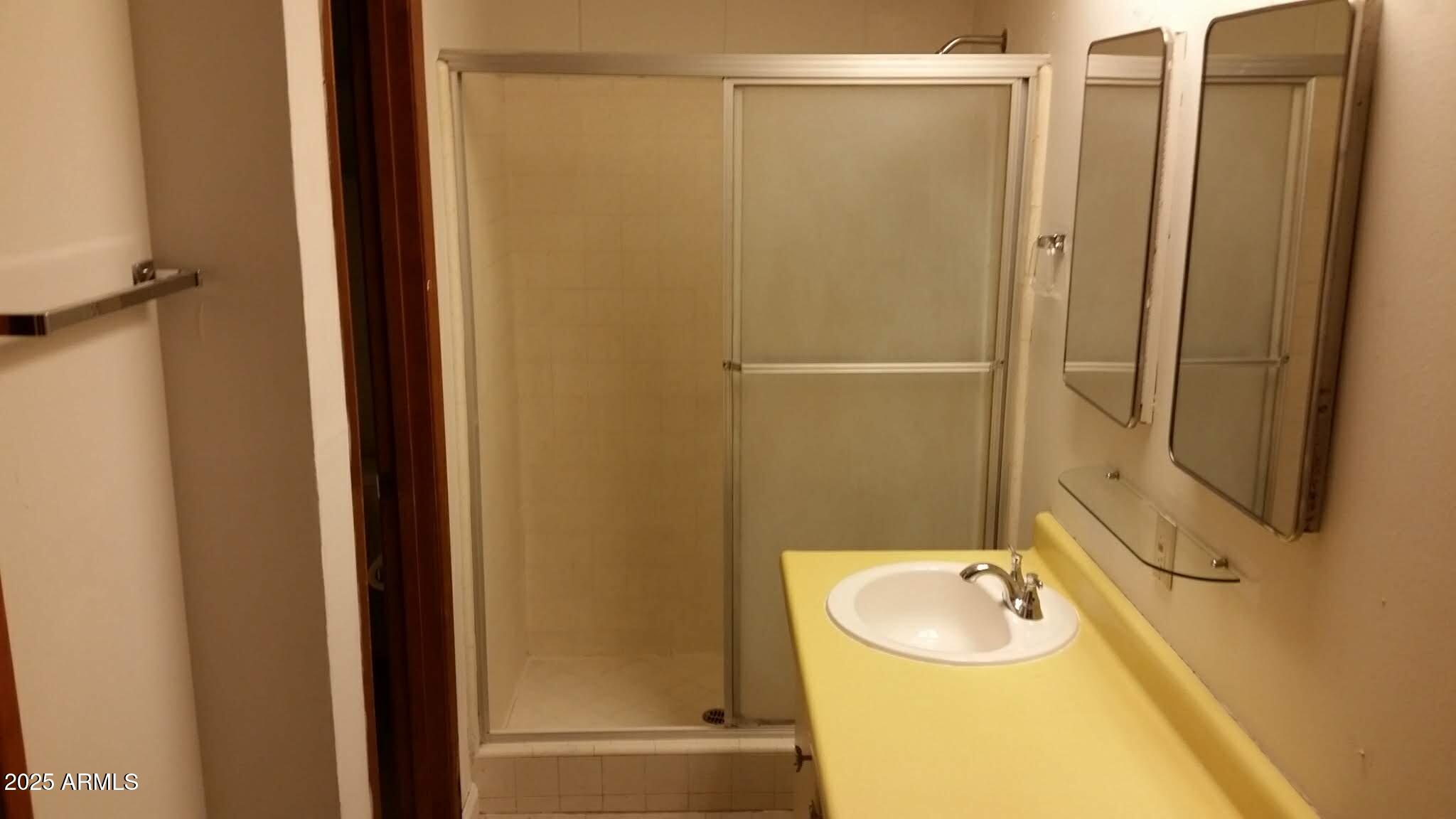 1234 South Farmer Avenue Tempe, AZ 85281 - Photo 44 of 47 a bathroom with a sink a toilet and shower