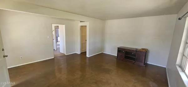 an empty room with windows