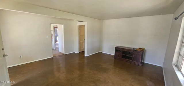 an empty room with windows