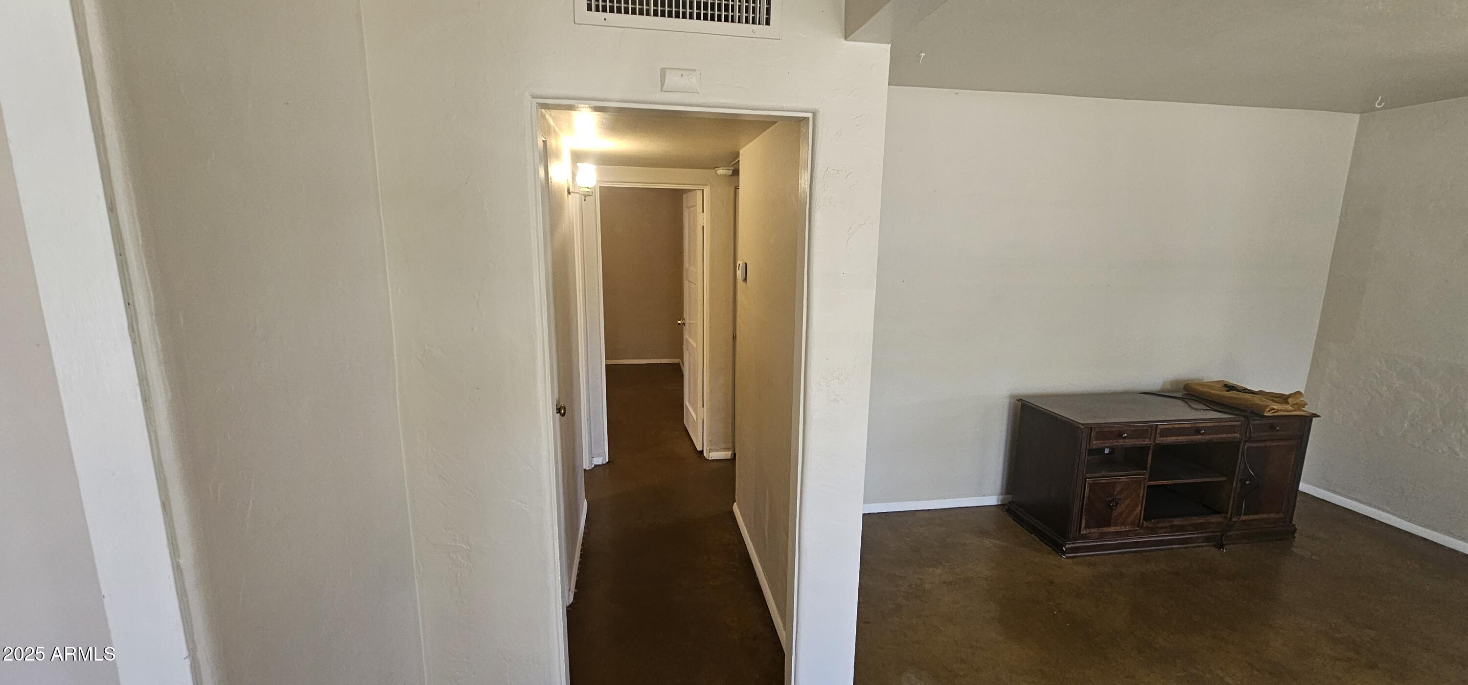 1234 South Farmer Avenue Tempe, AZ 85281 - Photo 9 of 47 a view of a livingroom with wooden floor