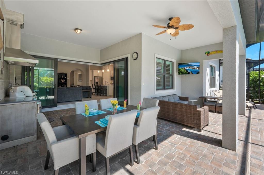 9640 Everglades Boulevard North Naples, FL 34120 - Photo 25 of 49 a living room with furniture and a table