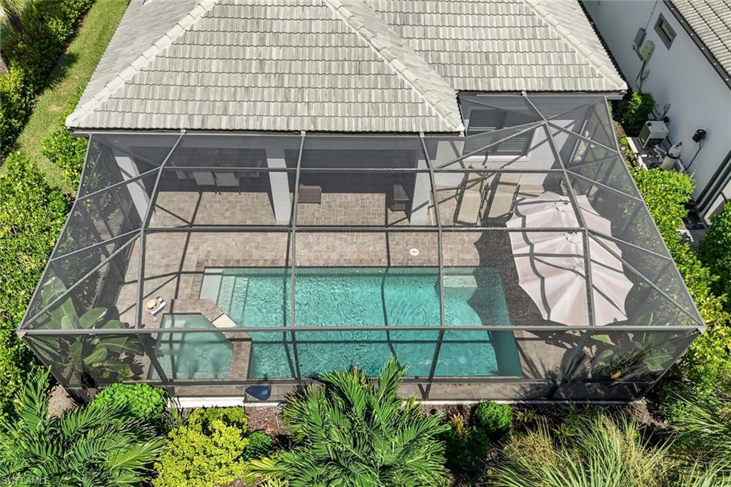 9640 Everglades Boulevard North Naples, FL 34120 - Photo 31 of 49 a view of a backyard with plants