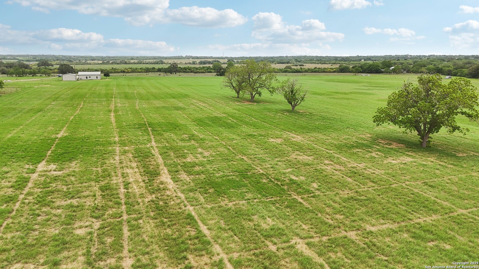 12885 La Vernia Road St. Hedwig, TX 78152 - Photo 7 of 22 a view of a lake with a big yard