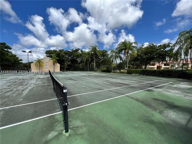951 Lyons Road, Unit 6206 Coconut Creek, FL 33063 - Photo 9 of 27 a view of basketball court