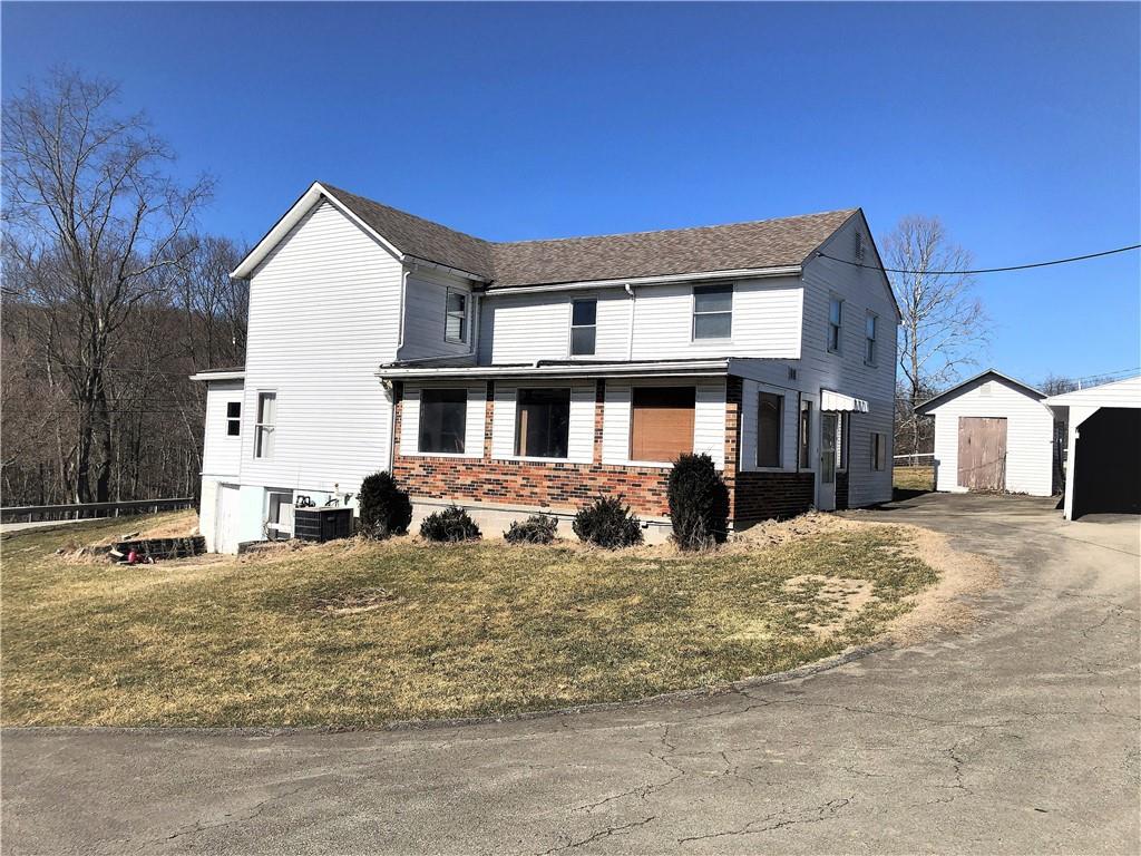 651 Lone Pine Road Washington, PA 15301 - Photo 1 of 16 a view of a house with a yard