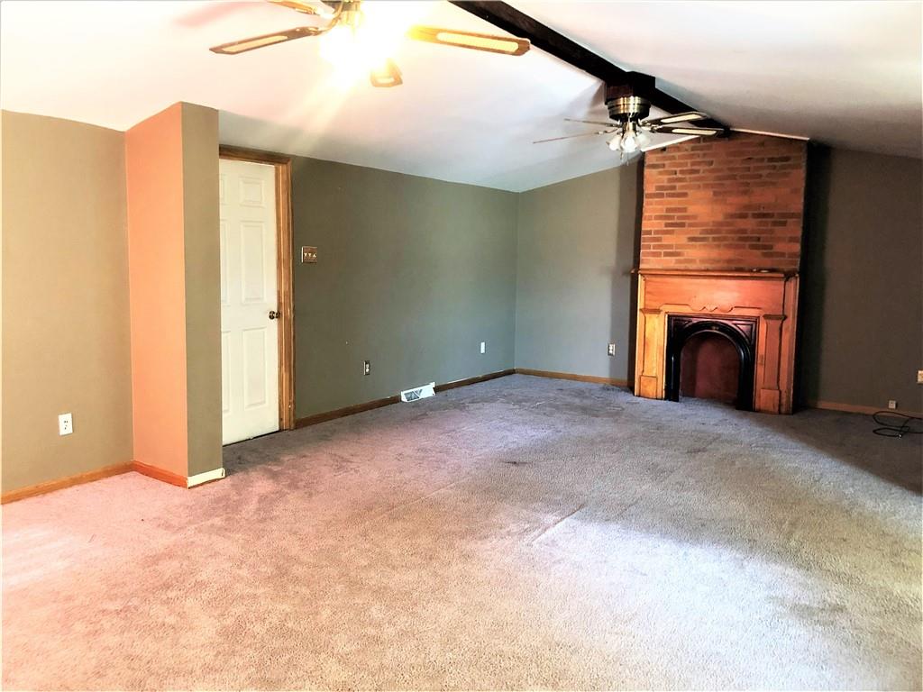 651 Lone Pine Road Washington, PA 15301 - Photo 2 of 16 a view of a livingroom with a fireplace