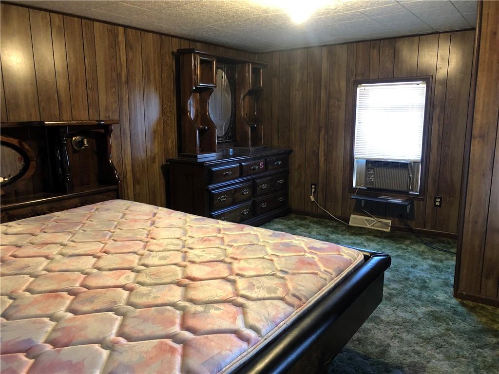 651 Lone Pine Road Washington, PA 15301 - Photo 9 of 16 a bed room with a bed and a television