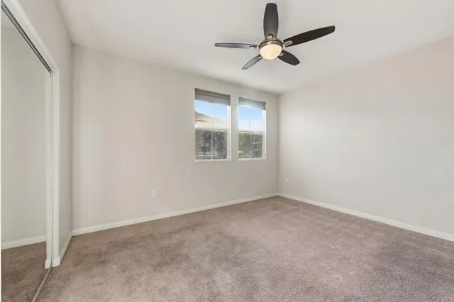 a bathroom with a shower sink vanity granite and shower