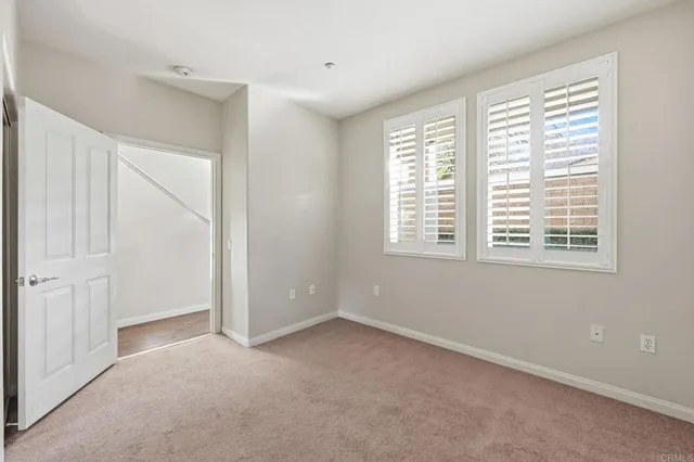 an aerial view of a city with lots of residential buildings