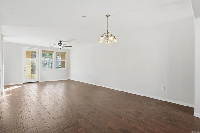 a bathroom with a sink double vanity granite tub and shower