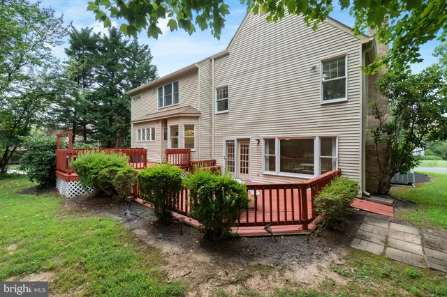an empty room with a empty space and a ceiling fan