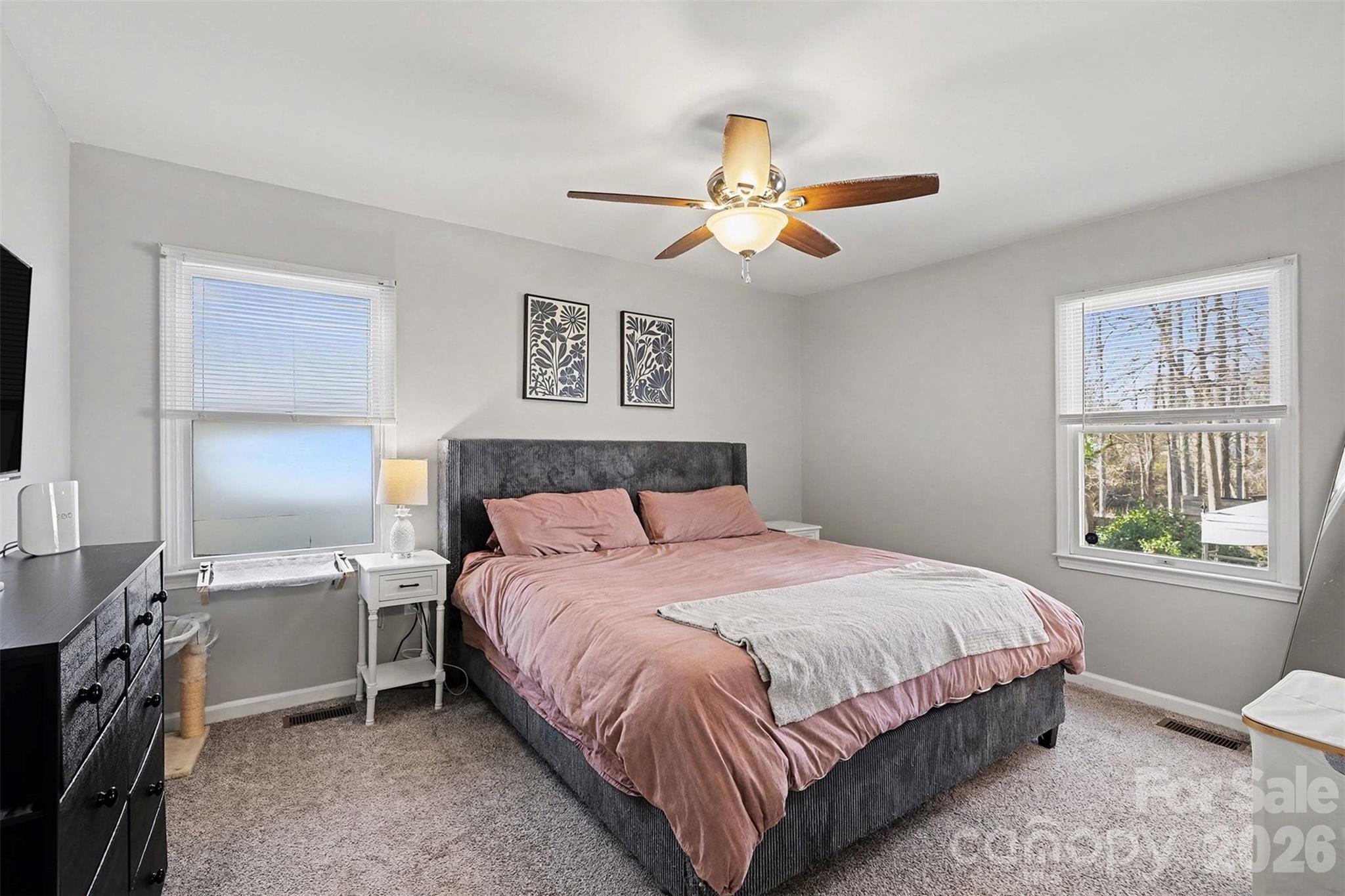 1318 Ridgewood Drive Concord, NC 28027 - Photo 14 of 27 a bedroom with a bed and a window