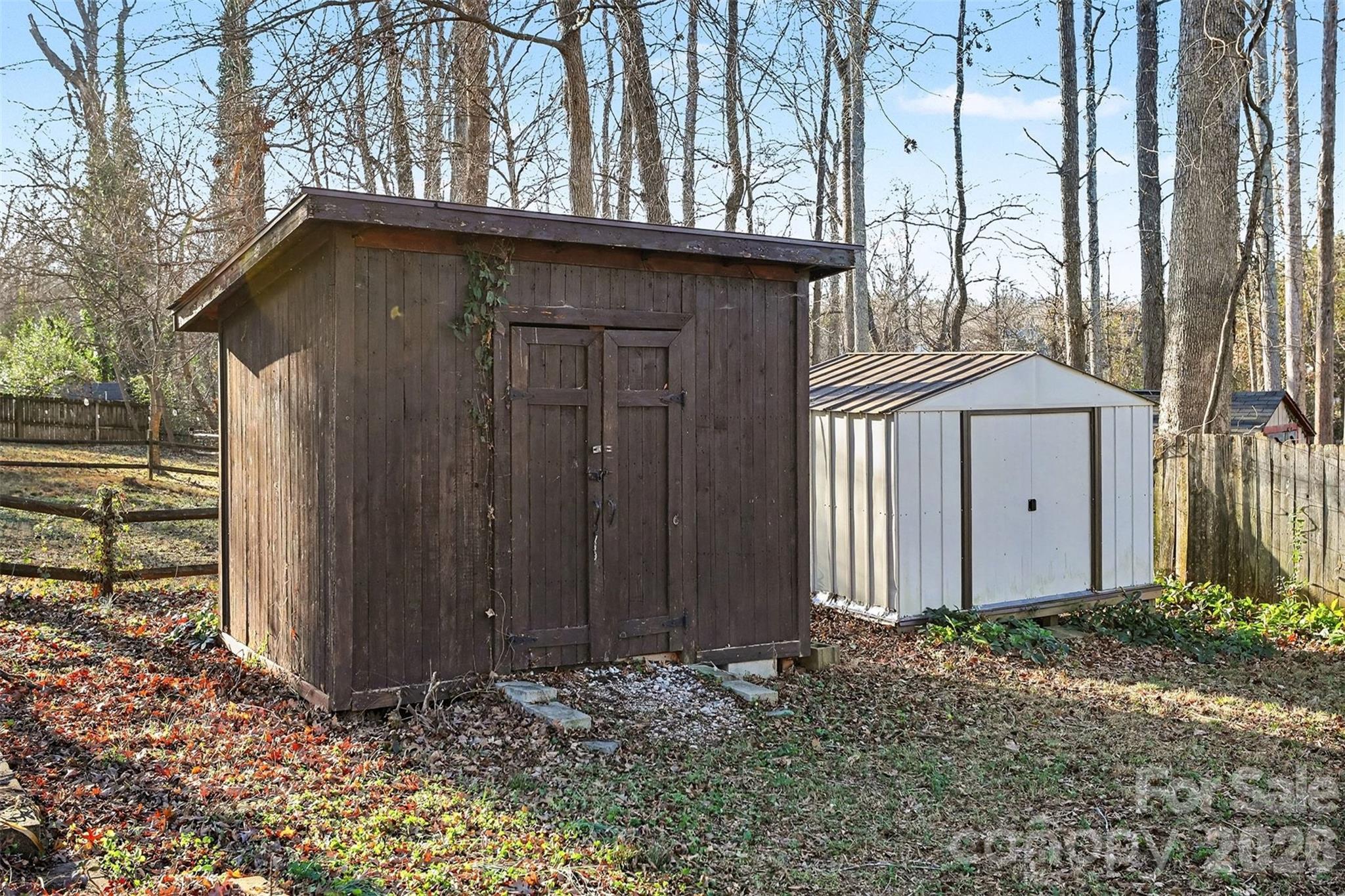 1318 Ridgewood Drive Concord, NC 28027 - Photo 25 of 27 a backyard of a house with lots of green space