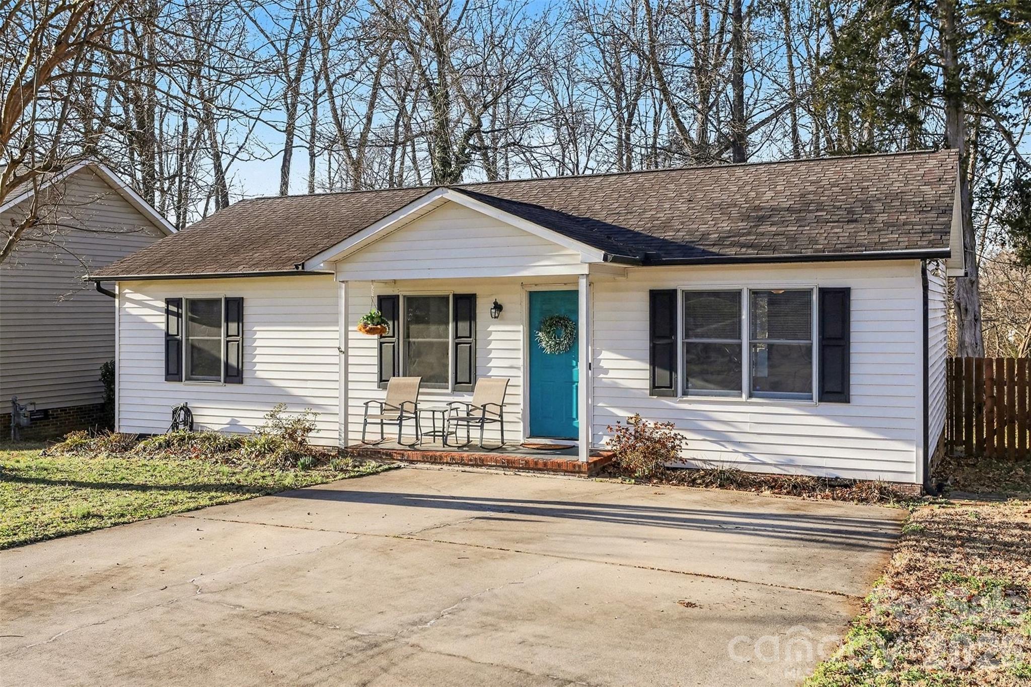 1318 Ridgewood Drive Concord, NC 28027 - Photo 26 of 27 a front view of a house with a yard