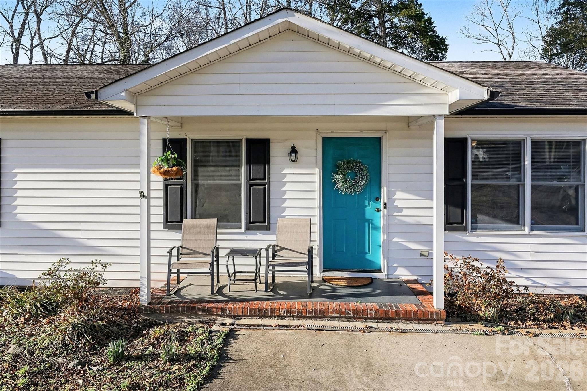 1318 Ridgewood Drive Concord, NC 28027 - Photo 27 of 27 a front view of a house with garden