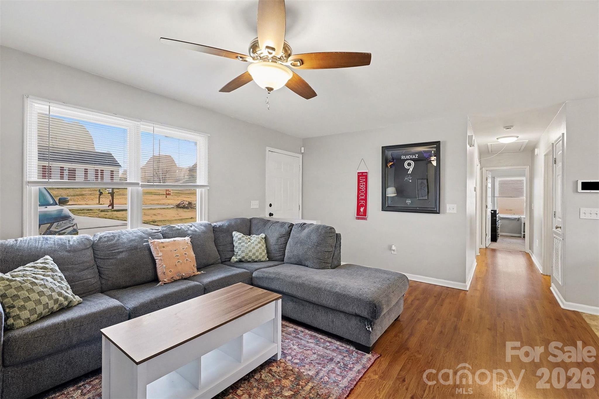 1318 Ridgewood Drive Concord, NC 28027 - Photo 4 of 27 a living room with furniture and a wooden floor