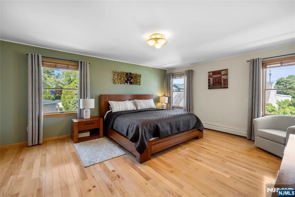66 Roehrs Drive Wallington, NJ 07057 - Photo 15 of 37 a bedroom with a bed and a couch