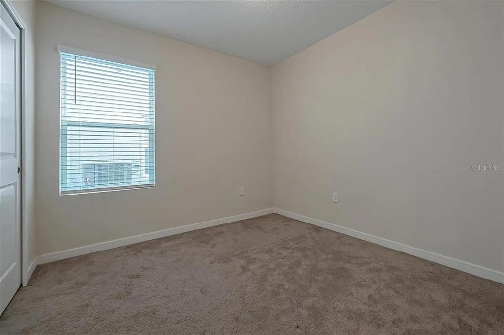 929 Rivers Crossing Street Clermont, FL 34714 - Photo 12 of 31 an empty room with a window