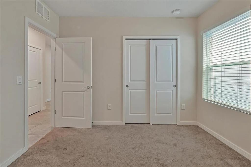 929 Rivers Crossing Street Clermont, FL 34714 - Photo 13 of 31 an empty room with windows