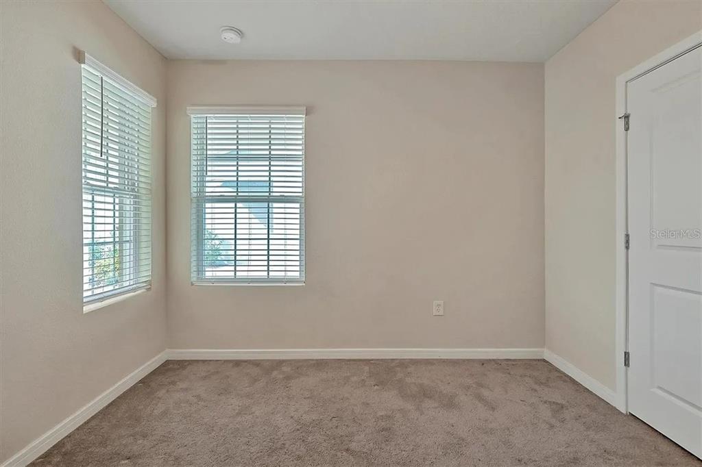 929 Rivers Crossing Street Clermont, FL 34714 - Photo 16 of 31 an empty room with a window