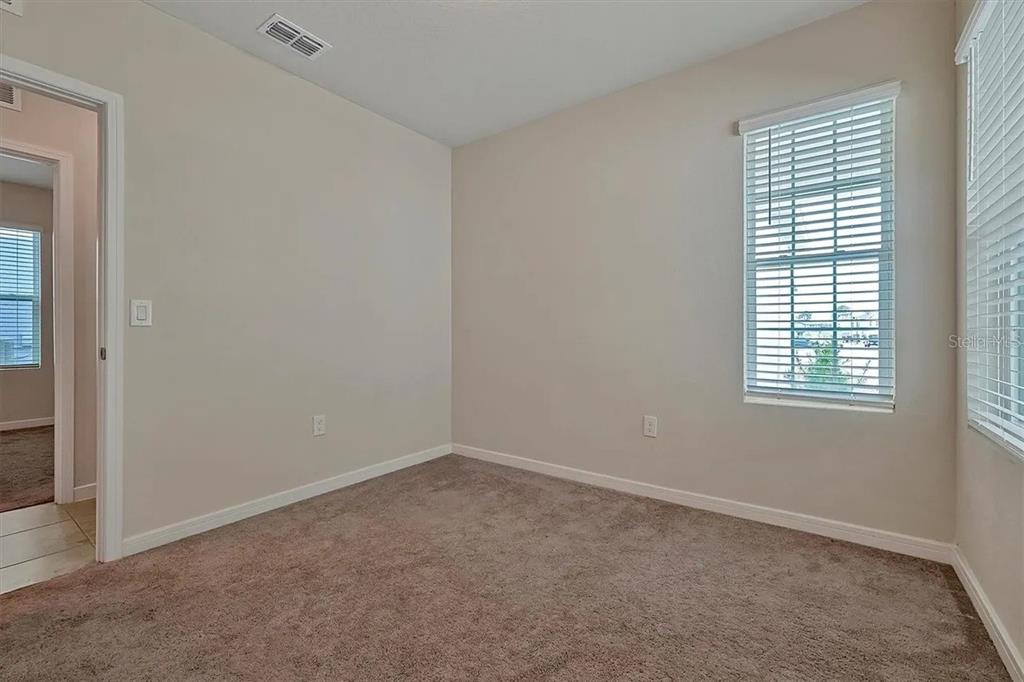 929 Rivers Crossing Street Clermont, FL 34714 - Photo 17 of 31 an empty room with a window
