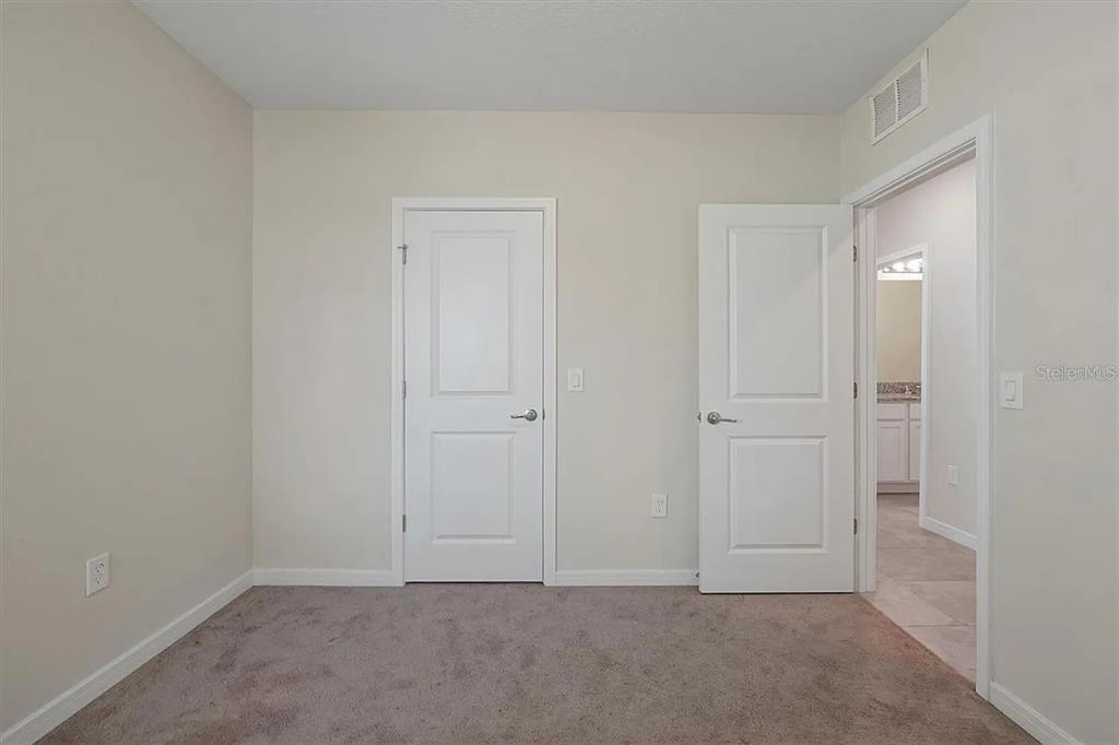 929 Rivers Crossing Street Clermont, FL 34714 - Photo 18 of 31 a view of an empty room