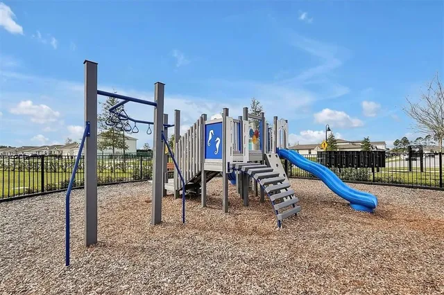 a view of a park with swings