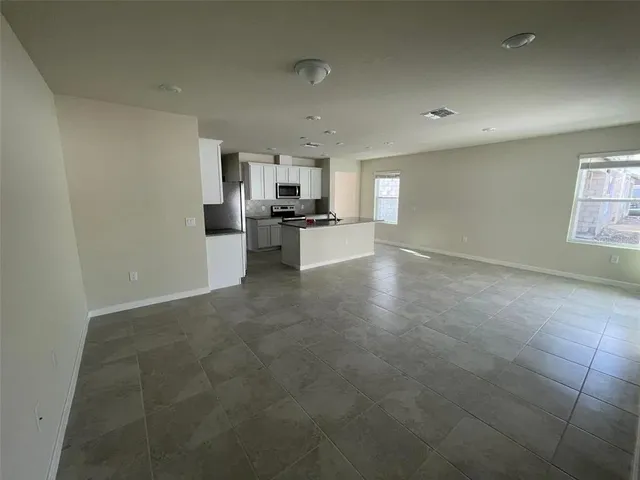 a view of a kitchen with a sink