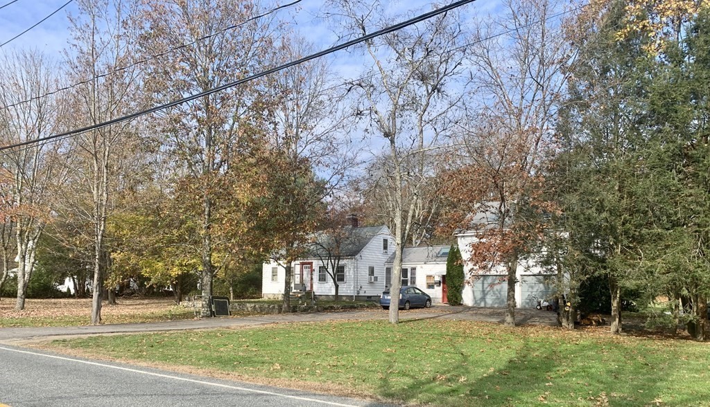 17 Everett Street Sherborn, MA 01770 - Photo 1 of 20 a brick building with trees in the background