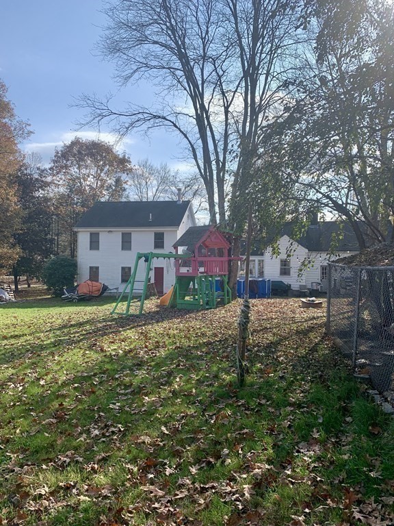 17 Everett Street Sherborn, MA 01770 - Photo 14 of 20 a view of a house with a yard