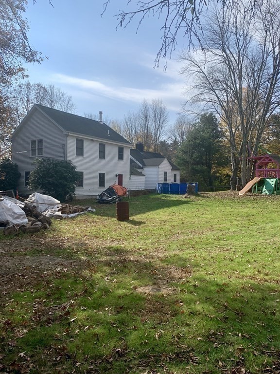 17 Everett Street Sherborn, MA 01770 - Photo 15 of 20 a view of a house with a yard