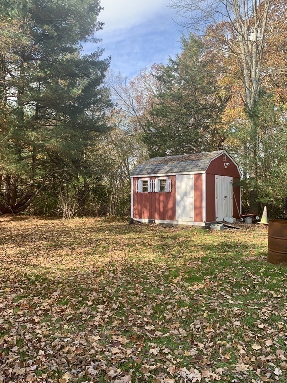 17 Everett Street Sherborn, MA 01770 - Photo 18 of 20 a fire hydrant in the middle of a field