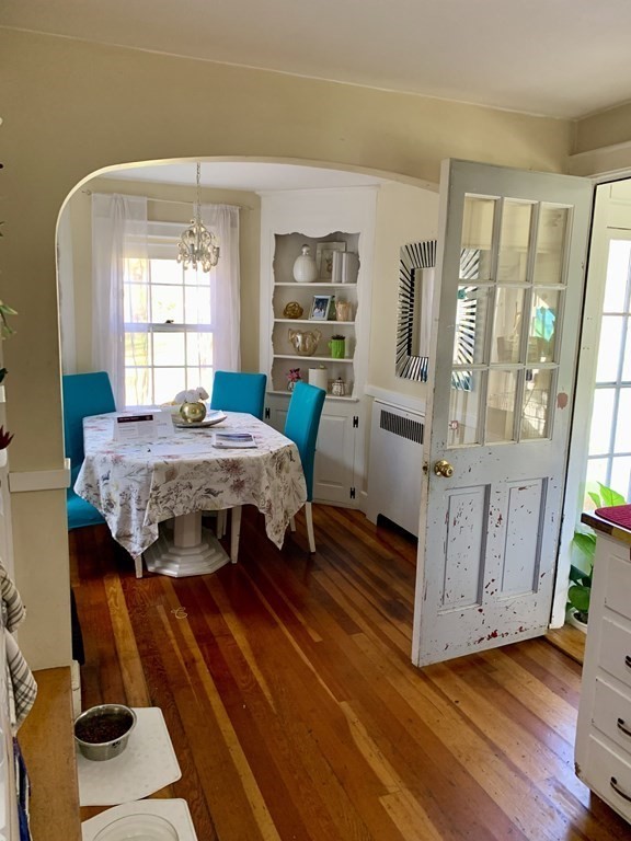 17 Everett Street Sherborn, MA 01770 - Photo 4 of 20 a bedroom with a bed and wooden floor