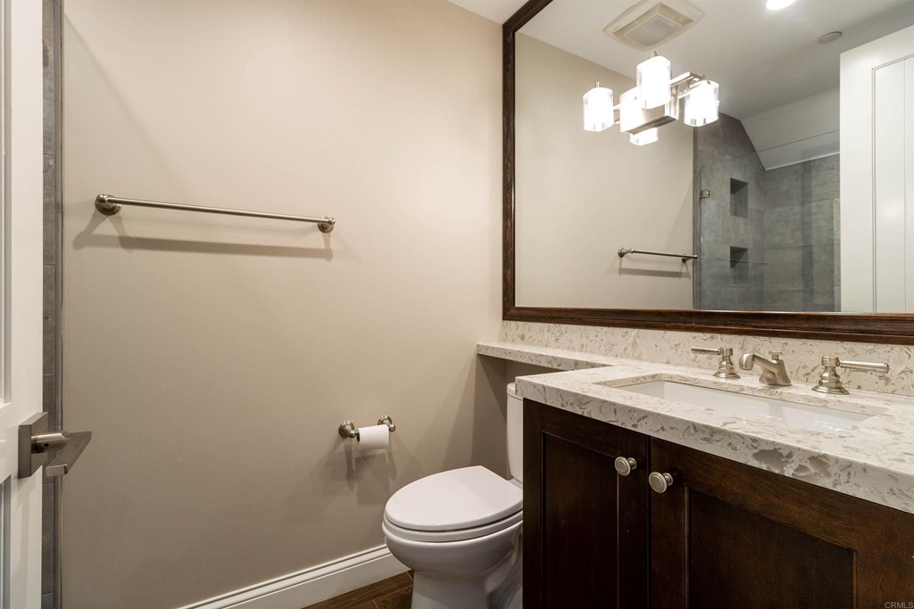 728 Silver Street La Jolla, CA 92037 - Photo 20 of 44 a bathroom with a sink and a toilet