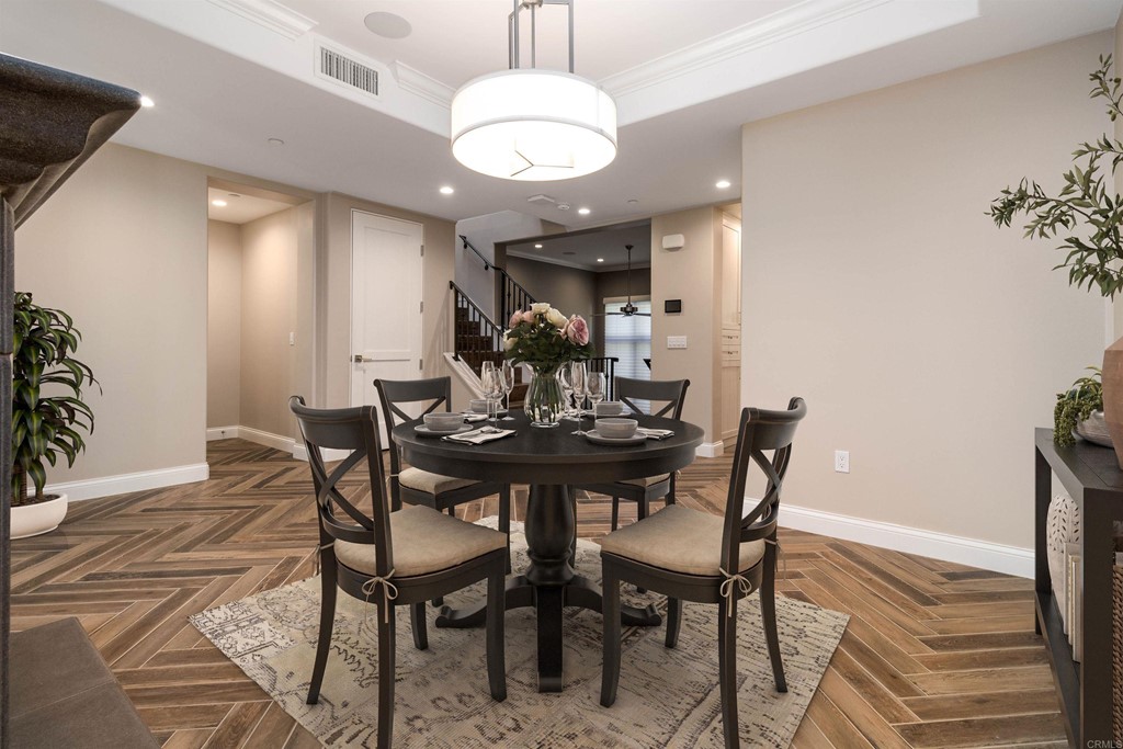 728 Silver Street La Jolla, CA 92037 - Photo 5 of 44 a view of a dining room with furniture and wooden floor