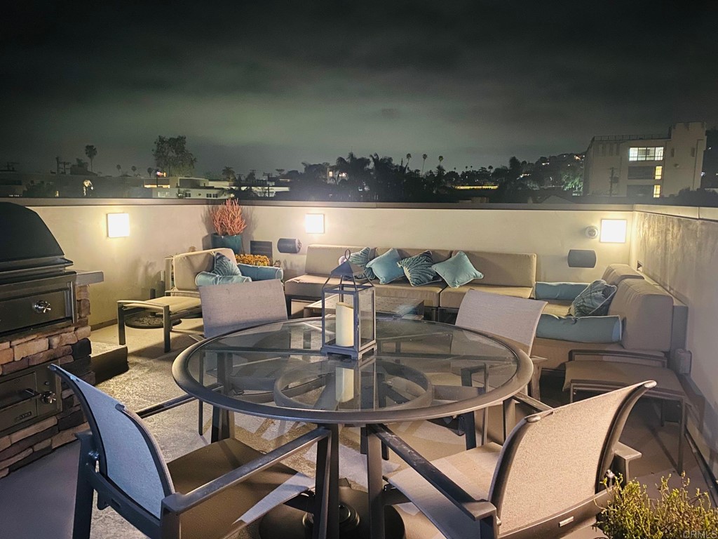 728 Silver Street La Jolla, CA 92037 - Photo 9 of 44 a dining room with furniture and wooden floor