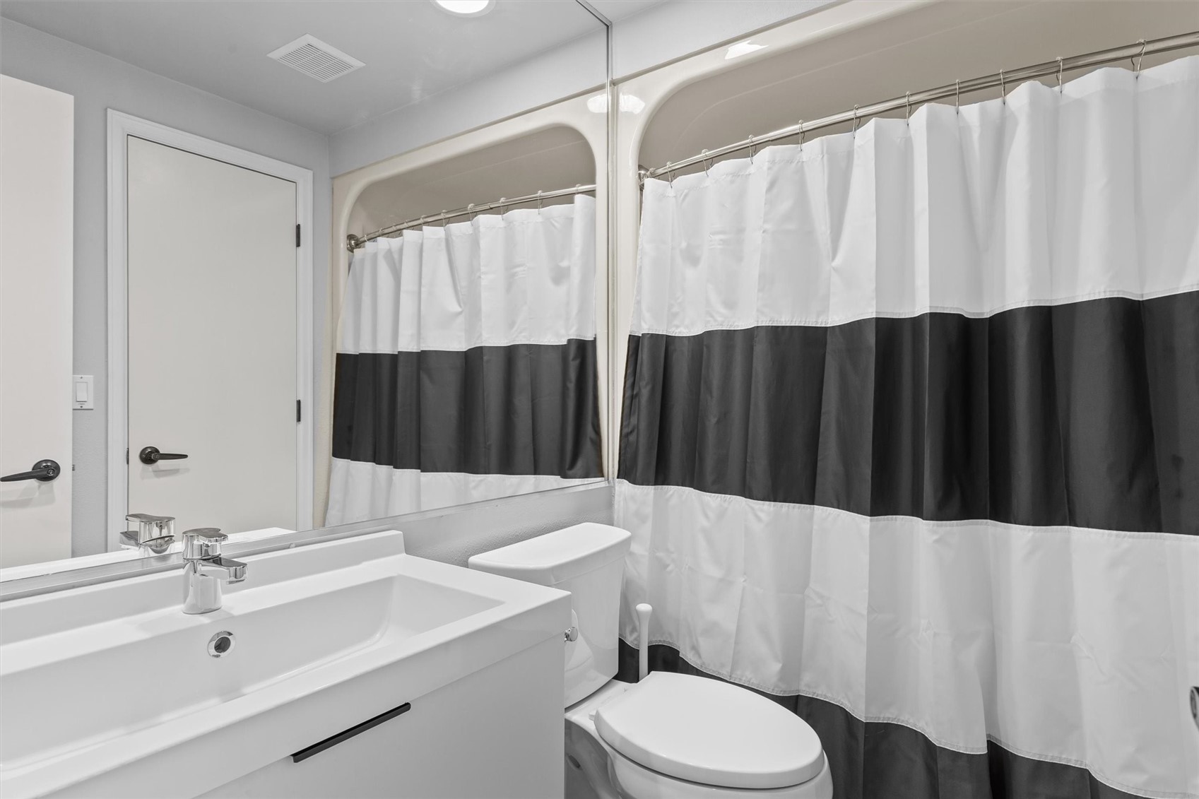 1724 Ski Time Square Drive, Unit R6 Steamboat Springs, CO 80487 - Photo 19 of 39 a bathroom with a sink a toilet and a tub