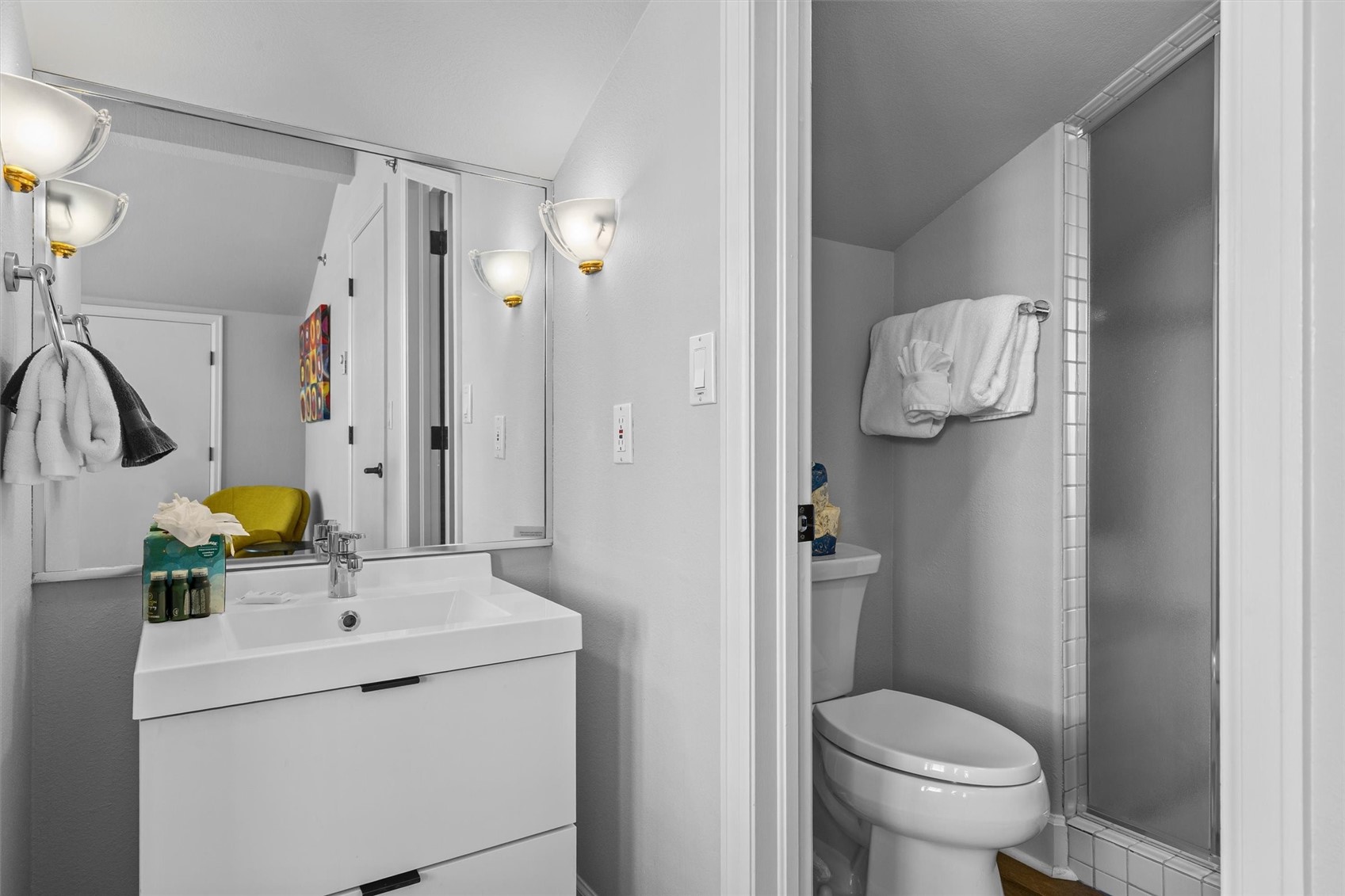 1724 Ski Time Square Drive, Unit R6 Steamboat Springs, CO 80487 - Photo 26 of 39 a bathroom with a sink toilet and shower