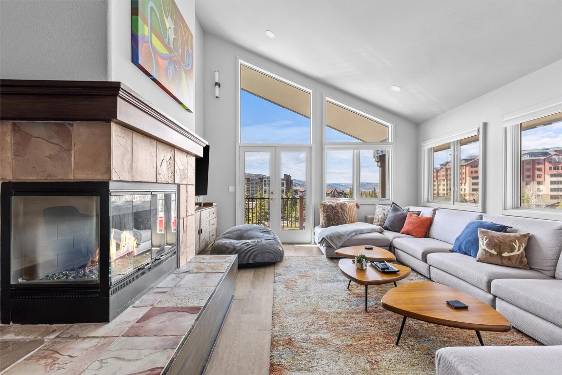 1724 Ski Time Square Drive, Unit R6 Steamboat Springs, CO 80487 - Photo 3 of 39 a living room with furniture and a large window