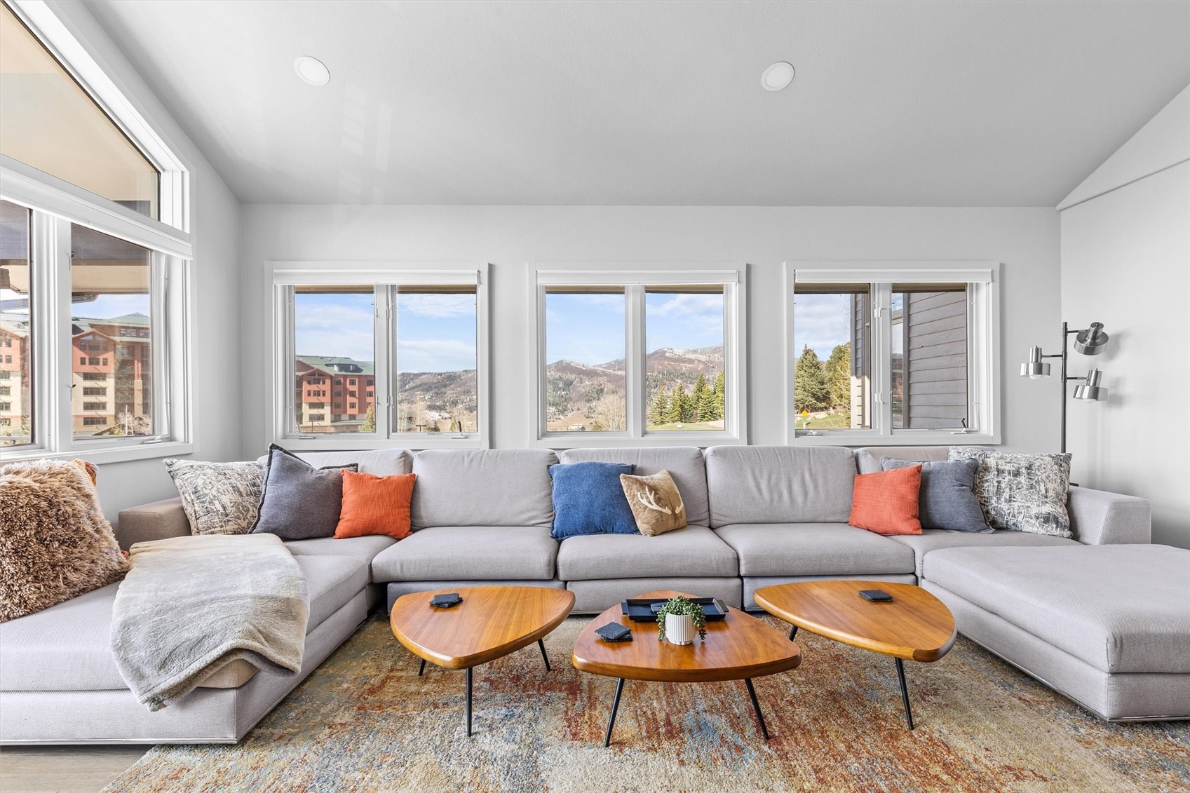 1724 Ski Time Square Drive, Unit R6 Steamboat Springs, CO 80487 - Photo 33 of 39 a living room with furniture and a large window